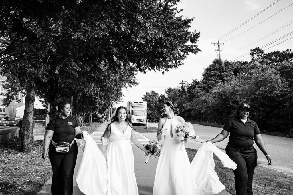 Couples Portraits of Lesbian Brides During North Texas LGBTQ Wedding at The Filter Building on White Rock Lake by Dallas Inclusive Wedding Photographers