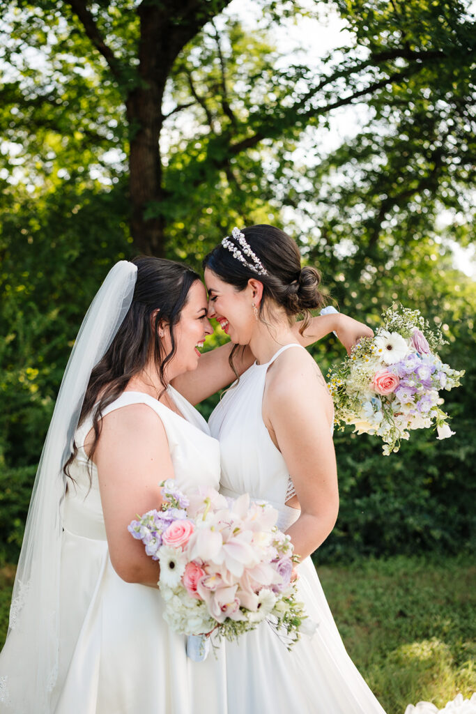 Couples Portraits of Lesbian Brides During North Texas LGBTQ Wedding at The Filter Building on White Rock Lake by Dallas Inclusive Wedding Photographers