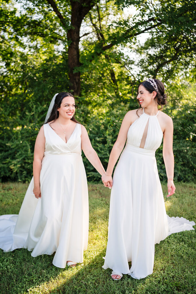 Couples Portraits of Lesbian Brides During North Texas LGBTQ Wedding at The Filter Building on White Rock Lake by Dallas Inclusive Wedding Photographers