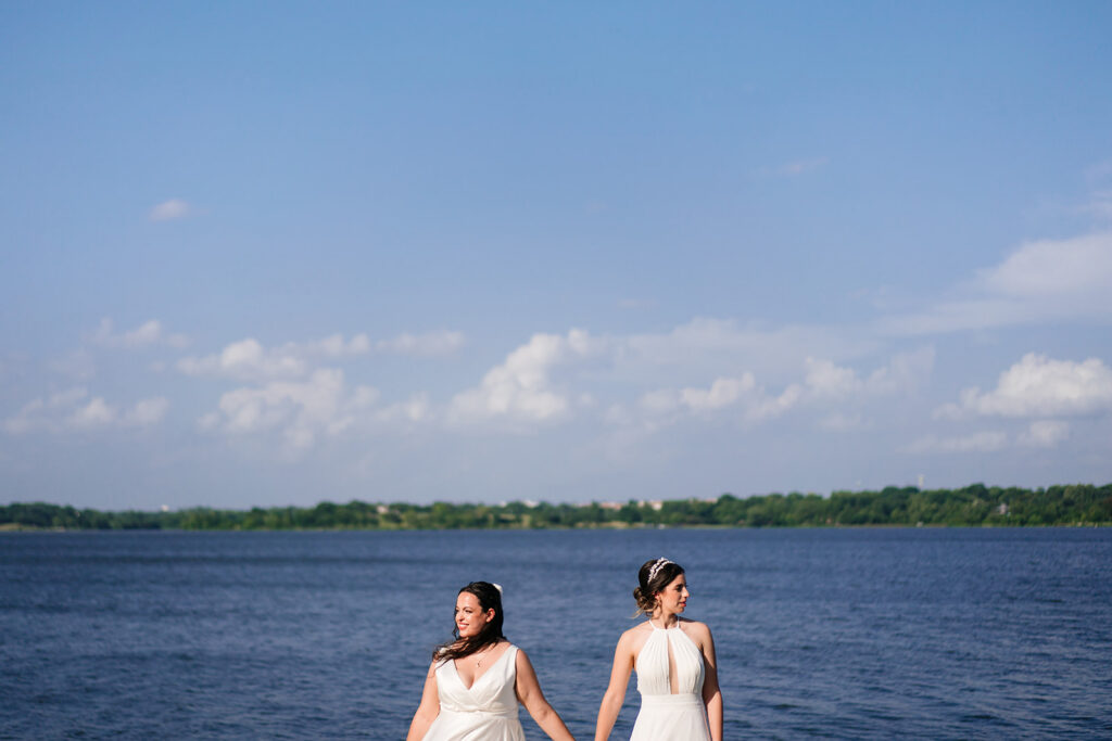 Couples Portraits of Lesbian Brides During North Texas LGBTQ Wedding at The Filter Building on White Rock Lake by Dallas Inclusive Wedding Photographers