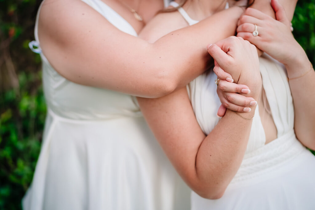 Bride Couple Portraits during North Texas LGBTQ Wedding at The Filter Building on White Rock Lake by Dallas Inclusive Wedding Photographers