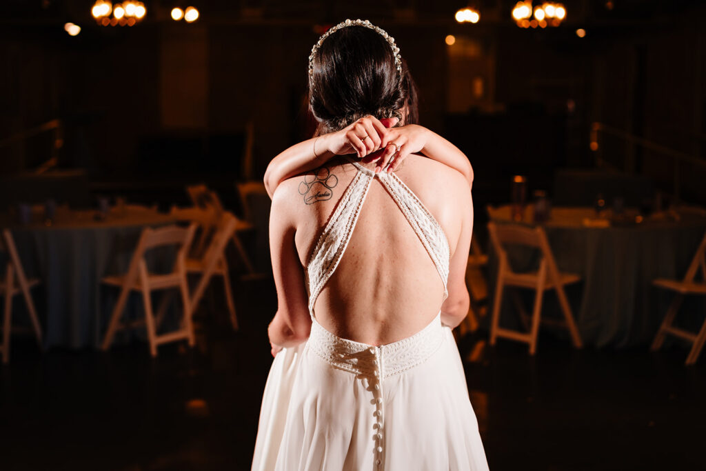 Lesbian Brides at their LGBTQ Wedding at The Filter Building on White Rock Lake by Dallas Inclusive Wedding Photographers