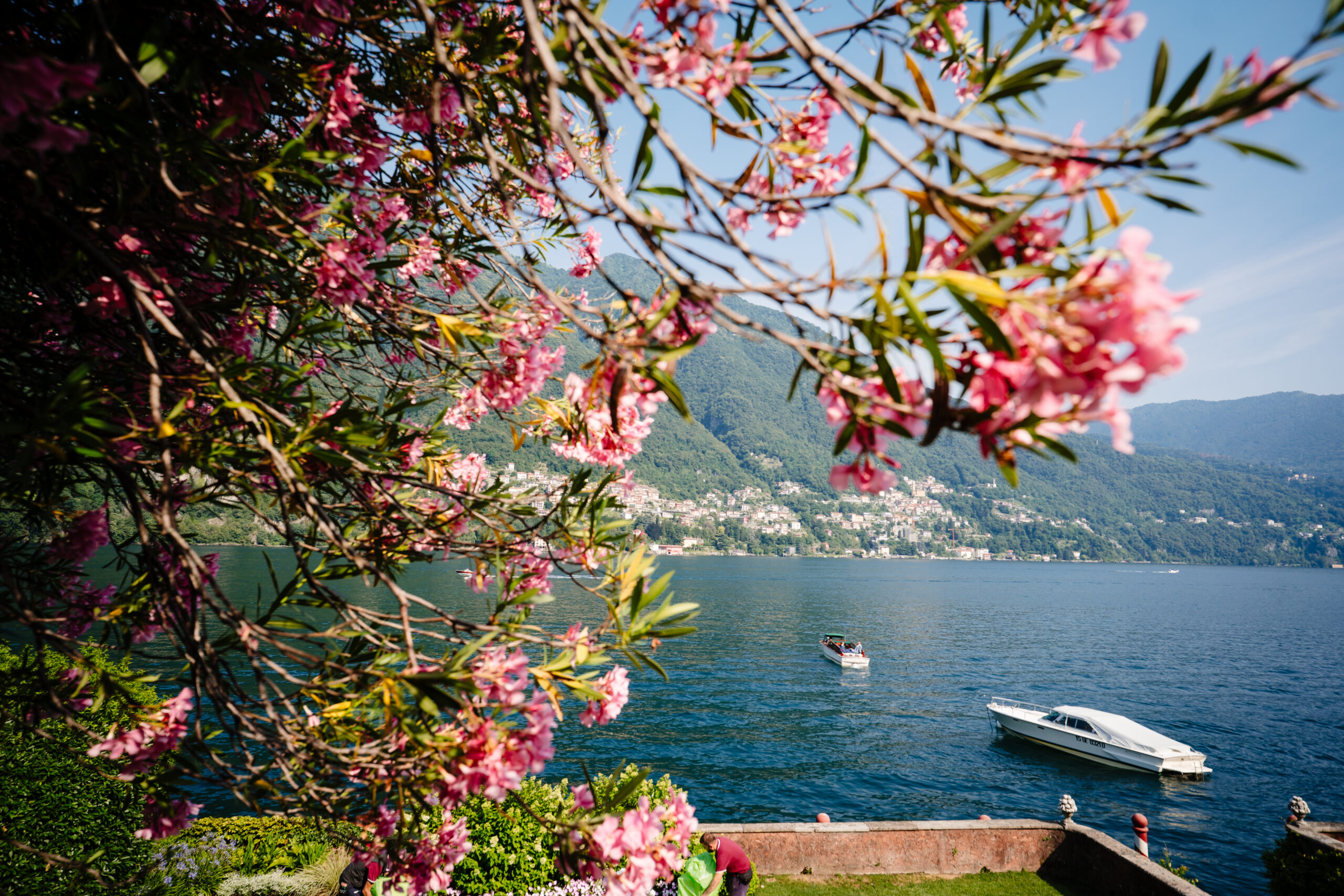 Gay Grooms Couples Boat Portraits on Lake Como in Laglio, Italy at Villa Regina Teodolinda by Destination Wedding Photographers The MacMeekens