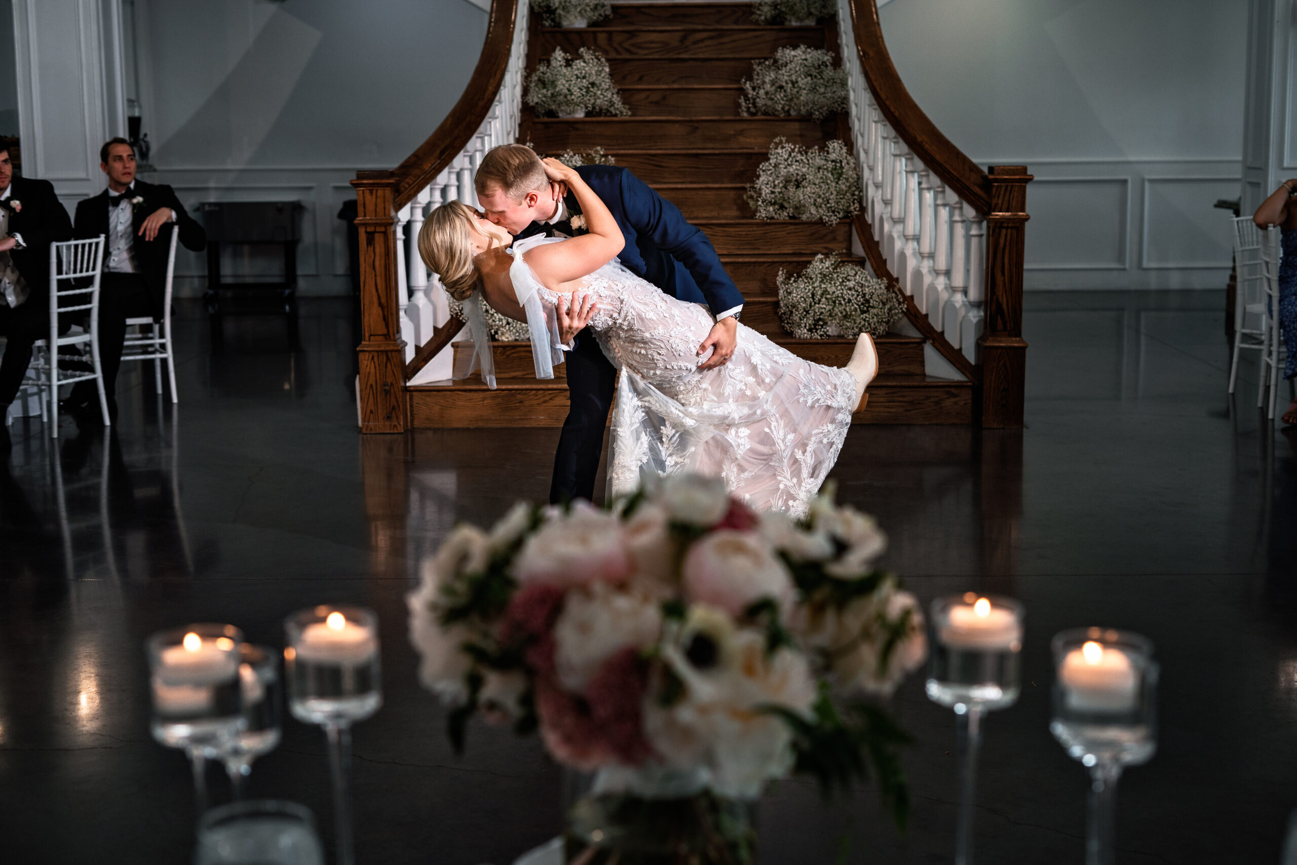 Bride and groom kiss during first dance